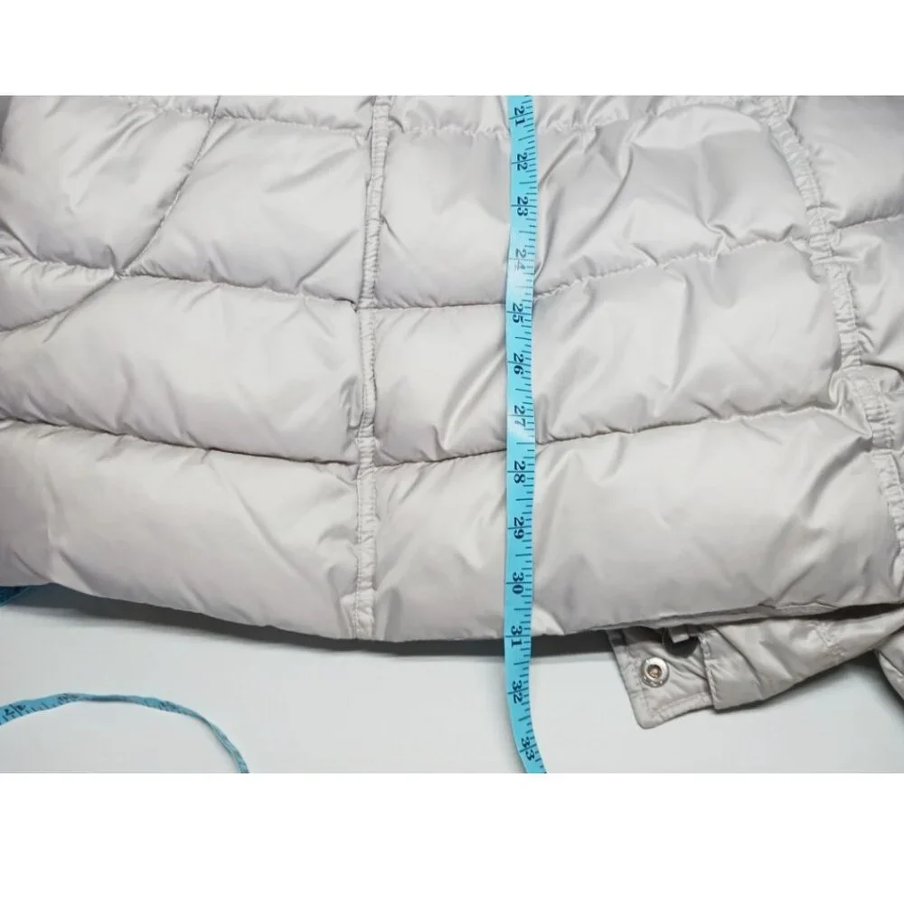Long winter puffer coat with duffle button design with a zip closure - Picture 13 of 15